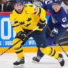 Tre Kronor Tar Ledningen: Sverige Besegrar Finland Med 2–1 och Toppar Grupp A